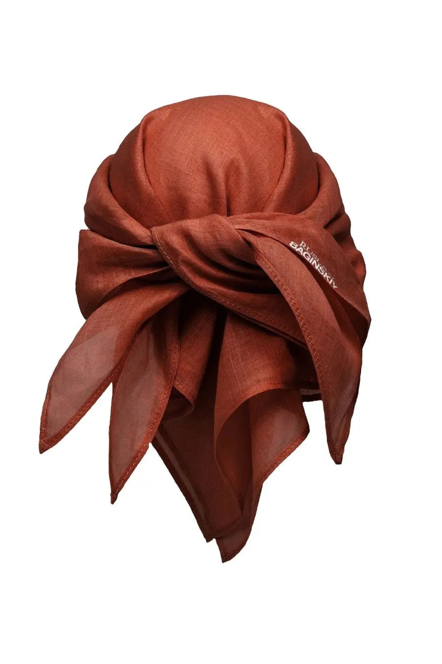 A rust-colored silk scarf tied in a decorative knot featuring the m detail from Ruslan Baginskiy Women’s Sciarpa Con Visore Red