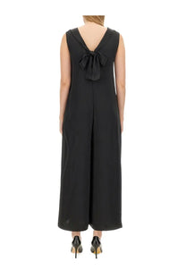 Black sleeveless jumpsuit with deep v-back and tied bow detail from s max mara morian suit collection