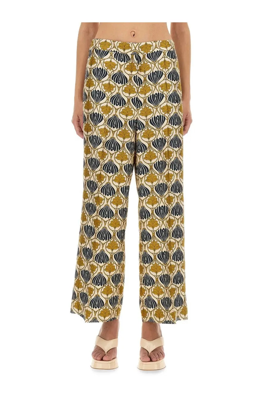 S Max Mara women’s silk wide-leg trousers with bold mustard yellow and navy blue leaf pattern on cream fabric