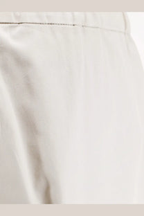 A close-up of white satin fabric with subtle sheen and fine stitching on s max mara smmargento vissuto cotton trousers ghiaccio
