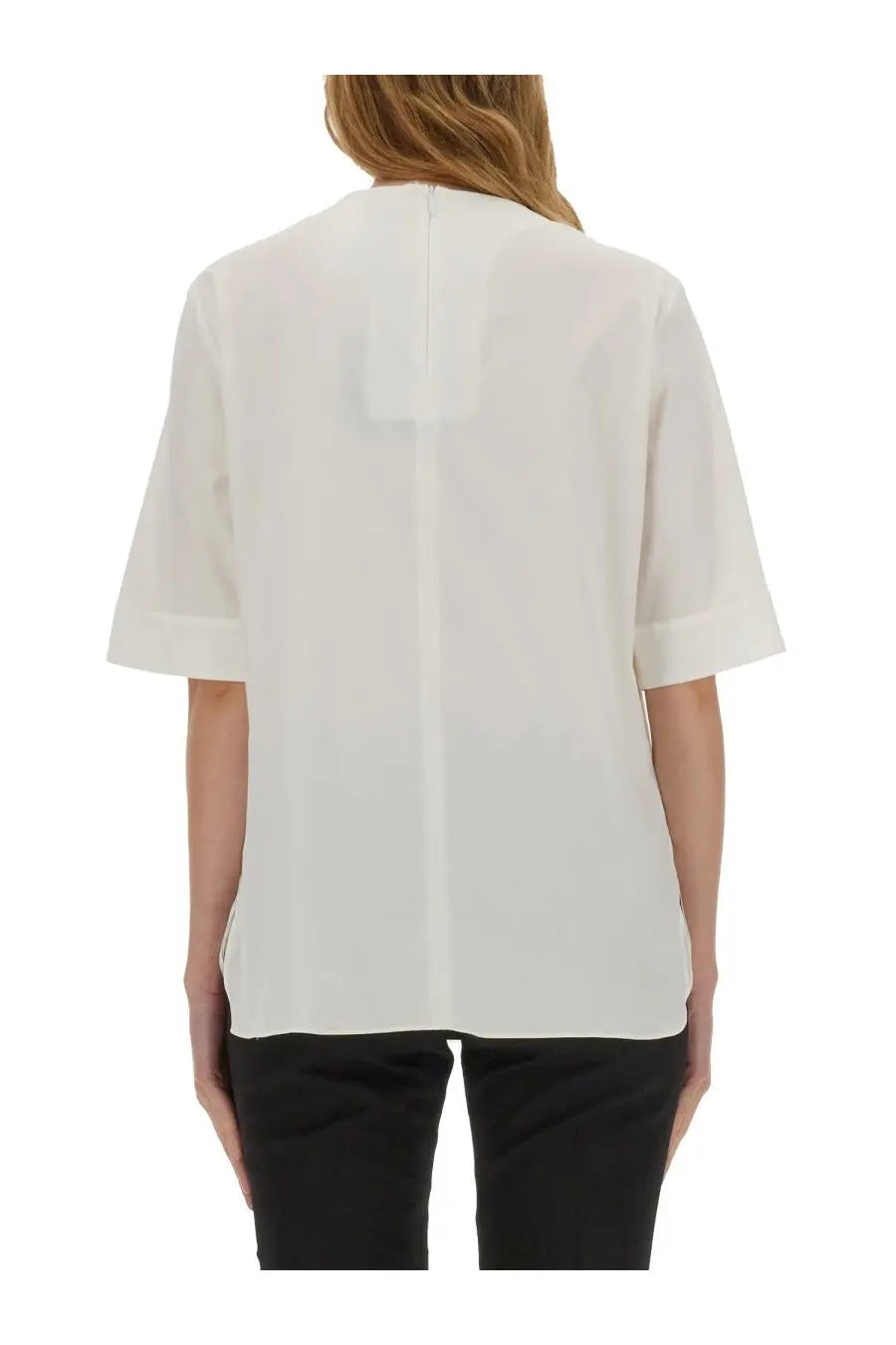 Back view of s max mara women’s white blouse with short sleeves and central back seam in minimalist design