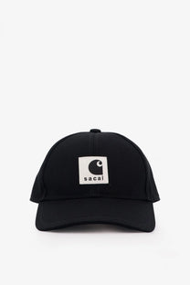 Sacai men’s black carhartt wip duck baseball hat with white patch featuring black curved c logo and sacai text