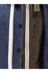 Sacai men’s blue denim jacket with white zipper and black buttons showcasing a stylish casual look