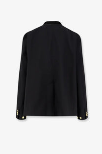 Sacai men’s black blazer jacket featuring gold-tone buttons on cuffs and collar for stylish formal wear