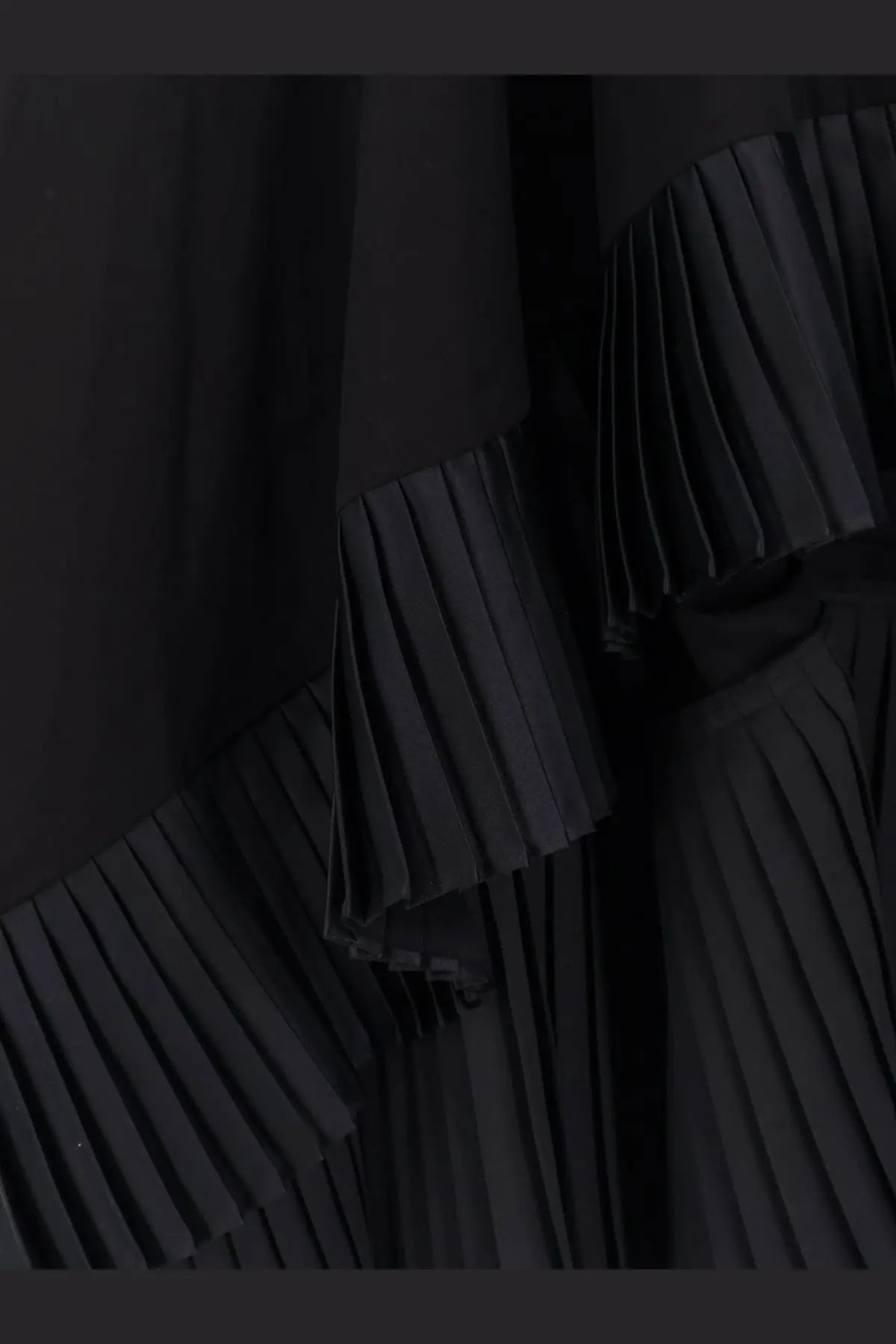 Sacai women’s black cotton dress featuring pleated fabric with layered ruffled detailing
