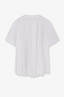 Sacai women’s white cotton and polyester short-sleeved blouse showing pleated back with soft flowing fabric