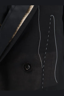 Sacai women’s black silk and organza blazer with gold-trimmed lapel and white stitching details