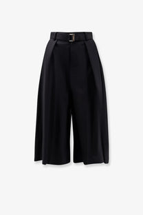 Sacai women’s black wool blend high-waisted wide-leg trousers with matching belt and silver-toned buckle