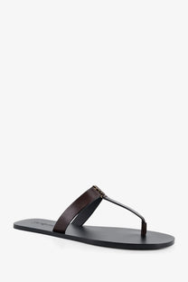 Saint Laurent men’s babylone black leather thong sandal with brown strap and gold-tone buckle