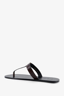 Saint Laurent men’s babylone black leather thong sandal with minimalist design and subtle sole branding