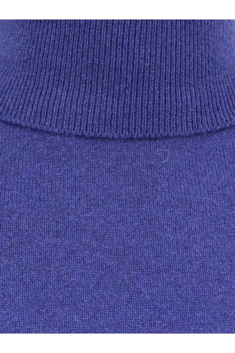 Saint Laurent men’s certified cashmere turtleneck sweater in rich royal blue with ribbed knit collar and fine-gauge fabric