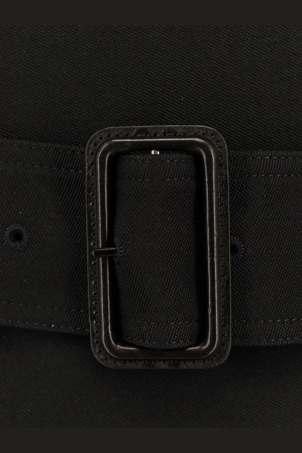 Black rectangular buckle with stitched edges on a black woven fabric belt of saint laurent men’s certified wool coat black