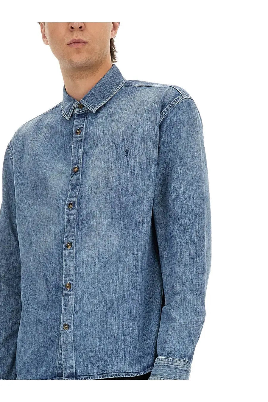 Saint Laurent men’s blue denim Cassandre button-up shirt with subtle faded wash and small embroidered logo on left chest