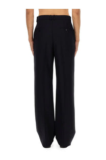 Saint Laurent men’s high waist black wide-leg trousers with tailored fit and belt looped at the waist