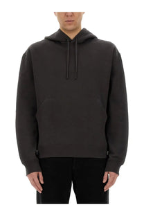 Saint Laurent men’s dark gray hooded sweatshirt with front pocket and matching drawstrings in soft fabric