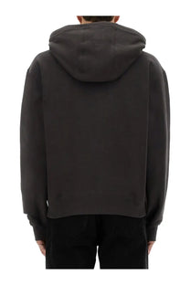 Saint Laurent men’s grey hooded sweatshirt with a relaxed fit and ribbed cuffs made from comfortable fabric