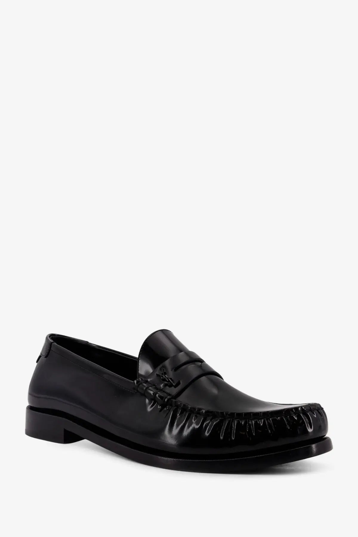 Saint Laurent men’s le loafer black patent leather loafer with a glossy finish and frayed detailing on the toe