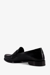Saint Laurent men’s le loafer black patent leather loafer with glossy finish and stitched detailing