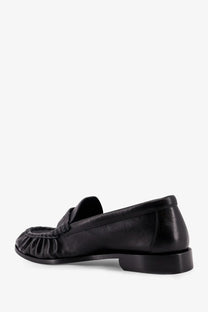 Saint Laurent men’s le loafer black leather loafer with ruched toe and low block heel, front view