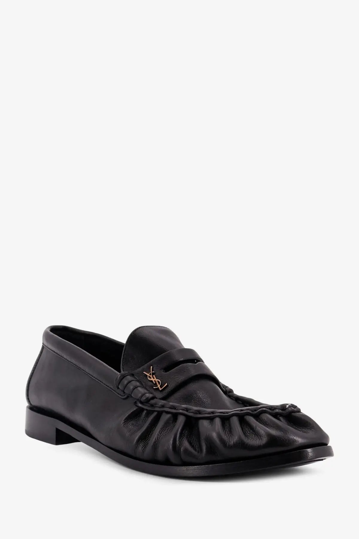 Saint Laurent men’s black leather loafer with ruffled toe and gold-tone YSL logo on the front