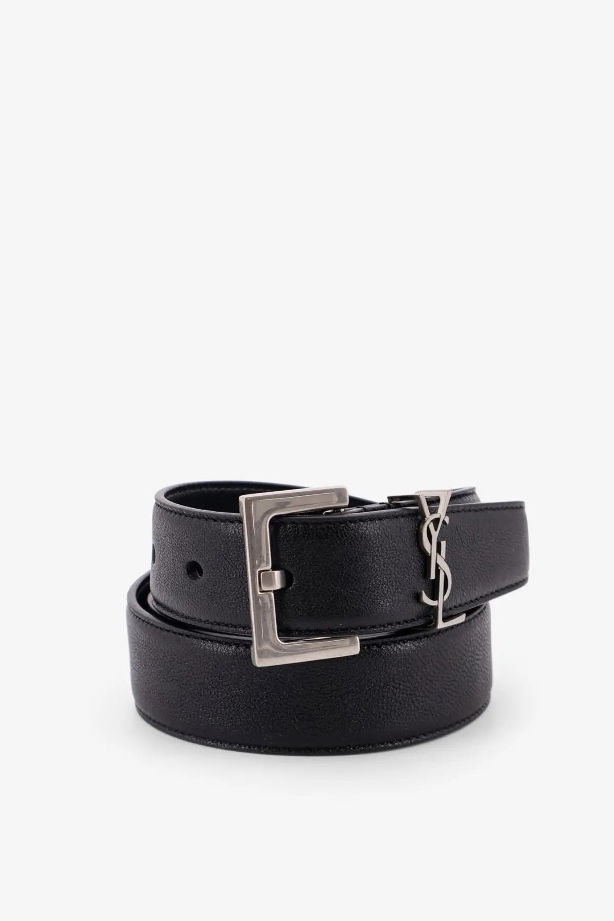 Saint Laurent men’s black leather belt with silver-toned rectangular buckle featuring the YSL logo