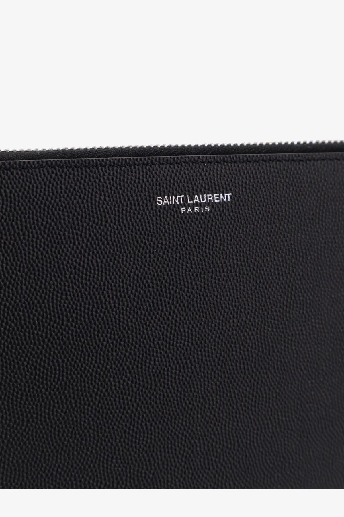 Black textured leather Saint Laurent men’s clutch with silver embossed saint laurent paris lettering on front