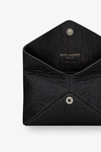 Saint Laurent men’s black leather envelope card holder with textured leather silver-tone hardware and embossed interior branding
