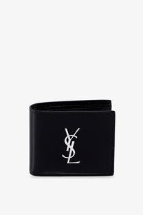Black leather Saint Laurent men’s wallet featuring a silver YSL logo on the front side