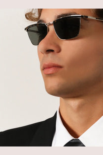 Saint Laurent men’s black rectangular sunglasses with sleek silver metal frame and grey lenses