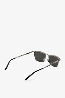 Saint Laurent men’s metal sunglasses with silver frames dark gray lenses and black temple tips in rectangular shape