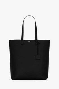 Saint Laurent men’s north south leather tote bag black with minimalist design and subtle brand logo