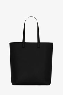 Saint Laurent men’s black leather tote bag with minimalist design and sleek straight handles for everyday use