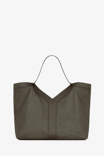 Saint Laurent men’s oversize olive green leather tote bag with distinctive v-shaped front panel and thin black handles