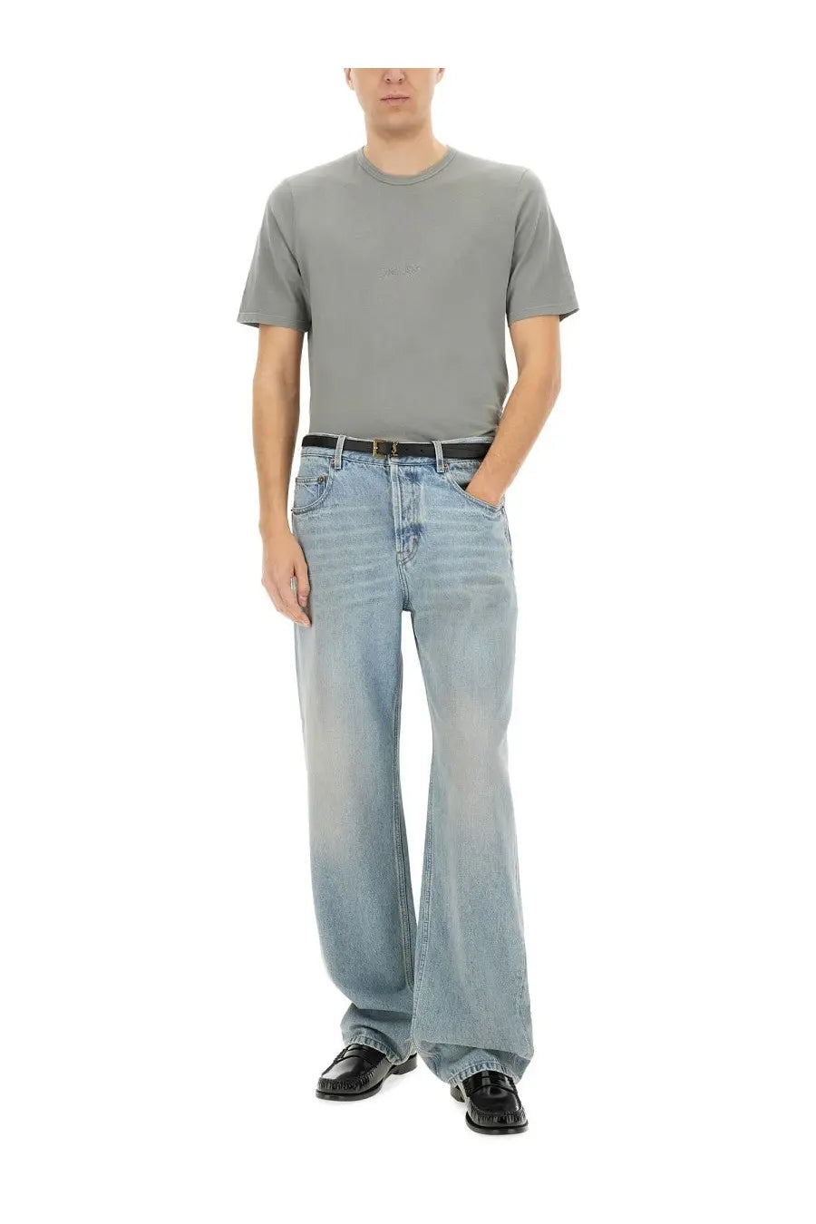 Light-wash denim jeans with a relaxed wide-leg cut and classic five-pocket design paired with saint laurent men’s grey shirt