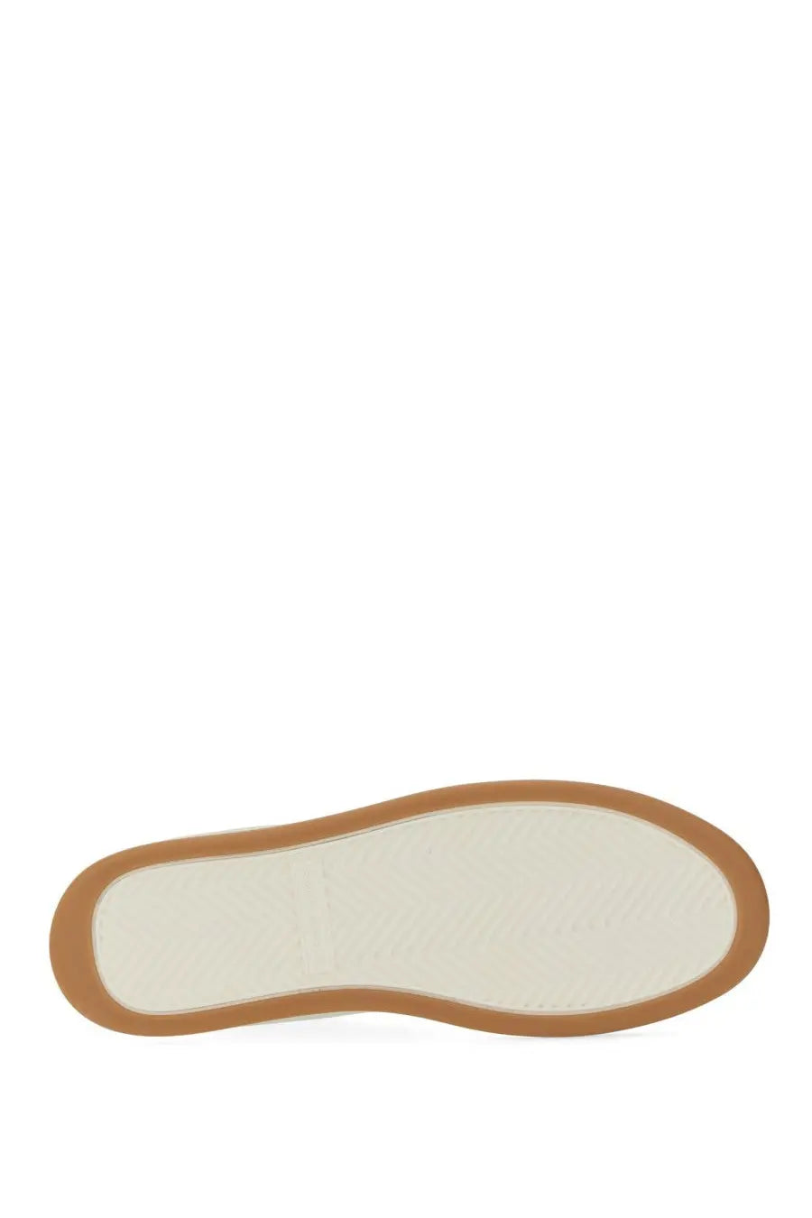 The insole of a saint laurent men’s sneaker sl white minimalist white leather shoe with a tan rubber sole