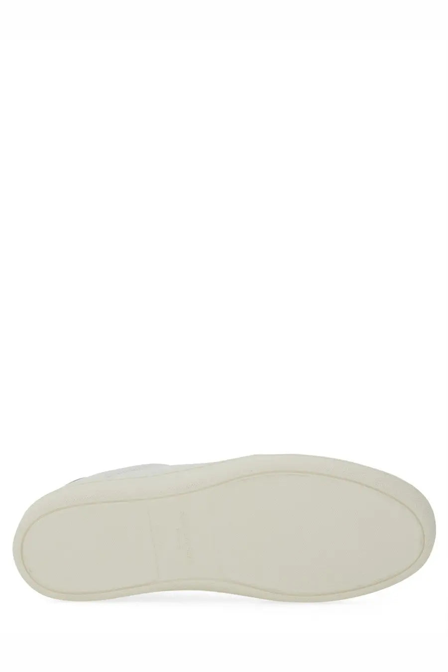 White rubber sole of Saint Laurent men’s Court Classic SL white minimalist sneaker showing outsole details