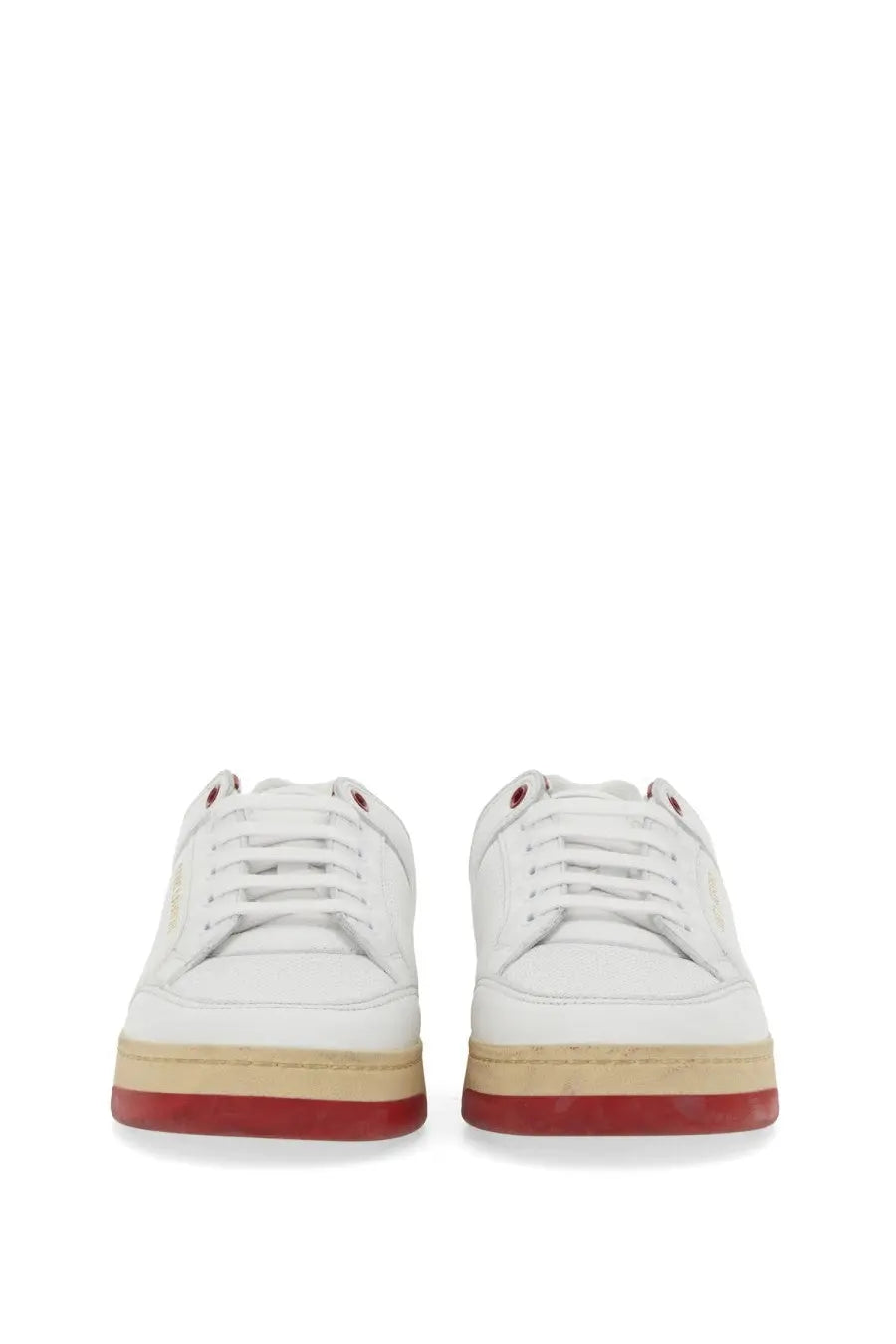 Saint Laurent men’s white leather sneakers with red and beige soles featuring a stylish multicolor design