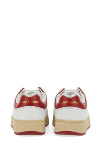 Back side of white and red Saint Laurent men’s sneakers sl multicolor with gold lettering on the heel