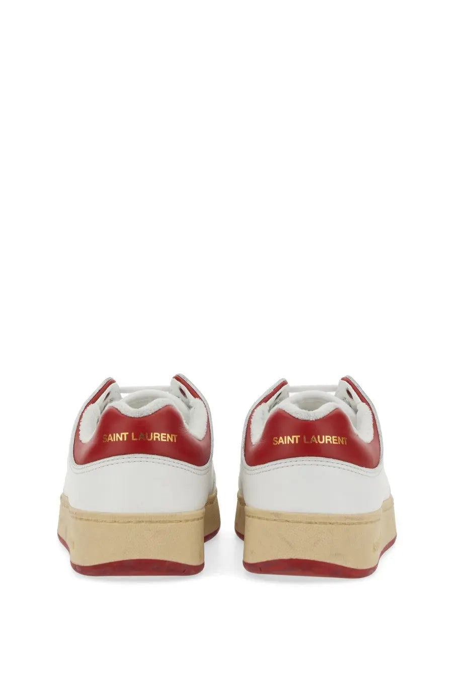Back view of white and red saint laurent men’s sneakers with gold lettering on the heel in multicolor design