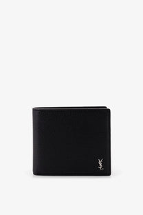 Saint Laurent men’s tiny hammered leather wallet in black with subtle texture and silver YSL logo on lower right corner