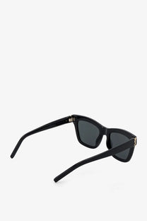 Saint Laurent women’s black rectangular acetate sunglasses with dark gray lenses and gold-tone metal temple accents