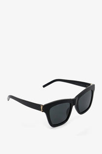 Saint Laurent women’s acetate sunglasses in black with dark gray lenses and gold-tone YSL logo on the temple