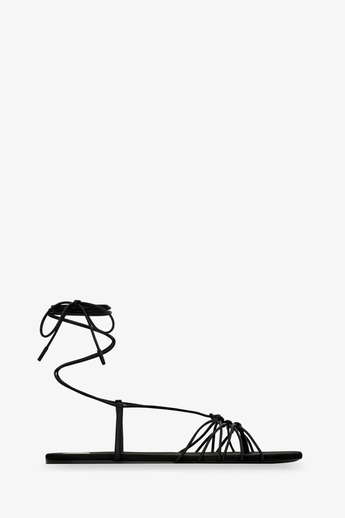 Saint Laurent women’s Babylone black leather sandal with strappy crisscross lacing and flat sole