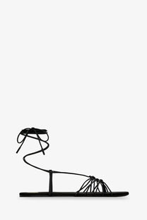 Saint Laurent women’s Babylone black leather sandal with strappy crisscross lacing and flat sole