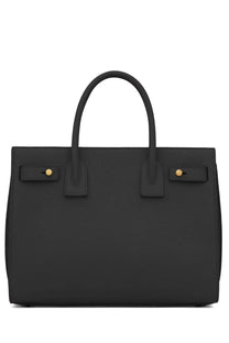 Saint Laurent women’s bag sac de jour baby black leather handbag with gold tone hardware and structured silhouette