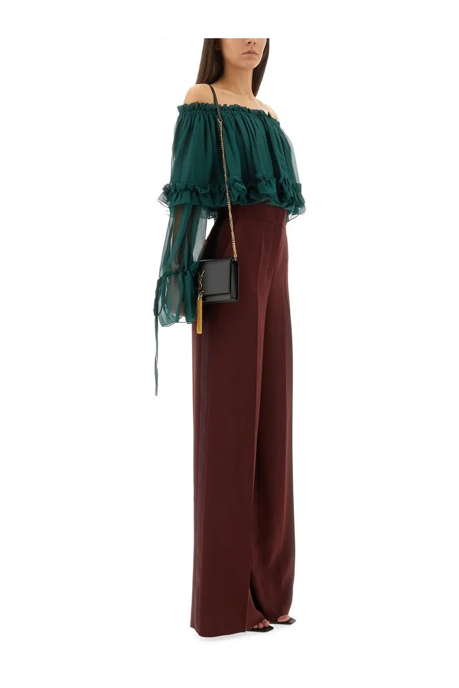 Saint Laurent women’s blue silk green mini crossbody bag with sleek black leather, gold-tone chain strap, and tassel detail