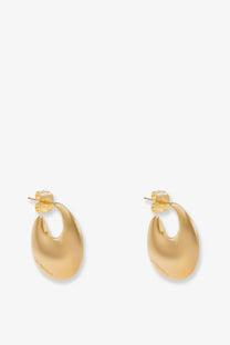 Saint Laurent women’s gold brass hoop earrings with a minimalist design and subtle inner branding engraving