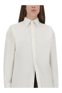 Saint Laurent women’s Cassandre crisp white cotton poplin shirt with classic collar and long sleeves