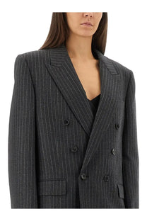 Saint Laurent women’s cassandre double breasted blazer in dark gray with thin vertical pinstripes and black buttons