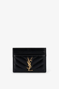 Black quilted leather card holder with gold-tone ysl logo from Saint Laurent womens Cassandre collection